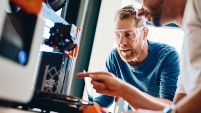 Designer working with a 3d printer.